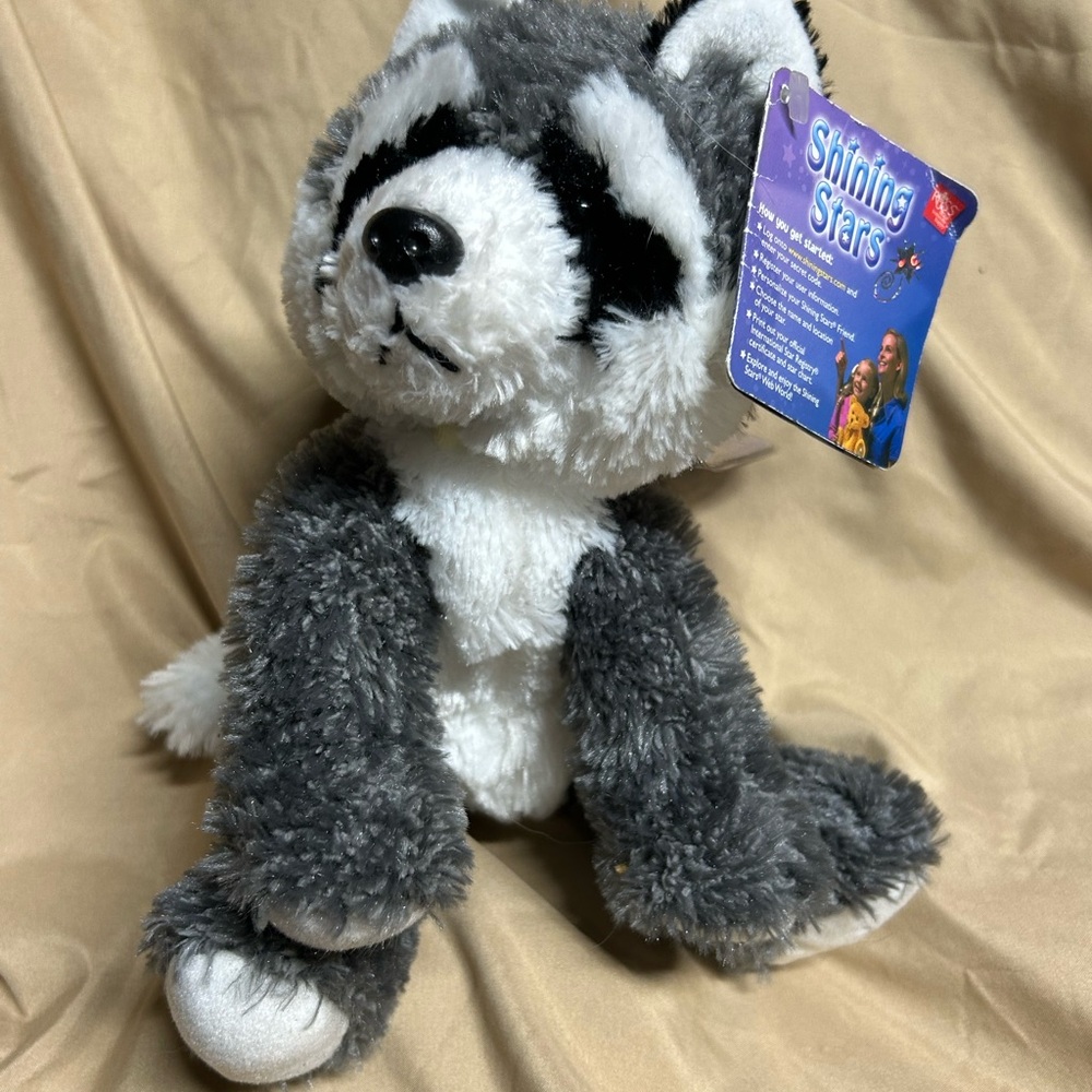 Russ Berrie Shining Stars Raccoon plush toy.
